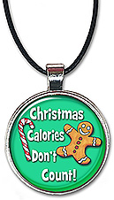 Fun holiday necklace with the message: Christmas calories don't count, in your choice of pendant or keychain.