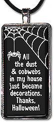 Handcrafted necklace with the funny message: All the dust and cobwebs in my house just became decorations. Thanks Halloween!