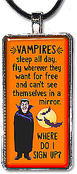 Handcrafter, lighthearted Halloween pendant or keychain with the message: Vampires sleep all day, fly wherever they want for free and can't see themselves in a mirror. Where do I sign up?