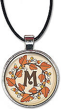 Handcrafted Autumn Leaves Initial necklace or keychain is personalized with the first letter of your name.