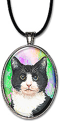 Original watercolor art black and white tuxedo cat jewelry is available as a necklace or keychain..