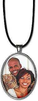 Custom Oval Photo necklace or keychain is personalized with your photo. A name or date can be added, and makes a unique gift.