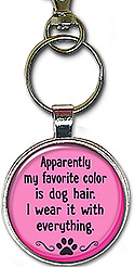 This handcrafted keychain has the message: apparently my favorite color is dog hair. I wear it with everything. It's also available as a necklace.