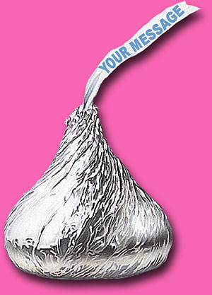 Giant Chocolate Kiss - How to make your own BIG chocolate kiss with a plastic funnel and chocolate melting wafers with easy instructions. You can even personalize the tag! For Valentine's Day or any occasion.