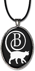 This cat monogram jewelry, is personalized with any initial, and is available as a necklace or keychain.