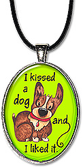 Whimsical handcrafted keychain or necklace has the message: I kissed a dog, and I liked it.