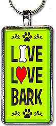 Handcrafted dog keychain has the message: LIVE, LOVE, BARK, and is available as a pendant or keyring.