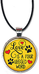 Handcrafted for dog and all animal lovers, this necklace or keychain features the quote: love is a four legged word..