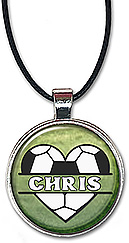 Love Soccer split-monogram pendant is personalized with any name in a heart-shaped soccer ball, and is also available as a pendant..