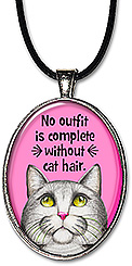 Whimsical original art cat necklace or keychain has the message: no outfit is complete without cat hair.