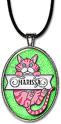 This orange cat monogram jewelry, is personalized with any name, and is available as a necklace or keychain..