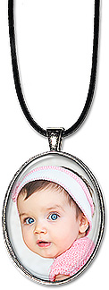 Custom Oval Photo necklace or keychain is personalized with your photo. A name or date can be added, and makes a unique gift.