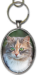 Sample of a custom Oval Photo keychain or necklace from your photo. A name or date can be added.