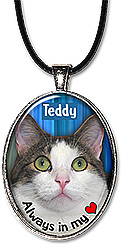 Sample of a custom photo pet memorial necklace, is also available as a keychain, and can be personalized with pet's name.