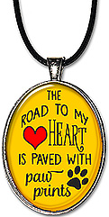 The Road To My Heart Is Paved With Paw Prints Necklace or Keychain would be an appreciate gift for any dog or animal lover.