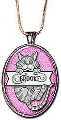 This silver tabby cat monogram jewelry, is personalized with any name, and is available as a necklace or keychain.